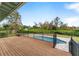 Large deck overlooking the pool and backyard at 2131 Dyan Way, Maitland, FL 32751