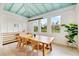 Bright dining room with light wood table and chairs, and a vaulted ceiling at 2131 Dyan Way, Maitland, FL 32751