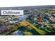 A beautiful aerial view of the neighborhood with a lake and community clubhouse at 2132 Darlin Cir, Orlando, FL 32820