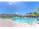 Expansive pool area with a clubhouse in the background at 2132 Darlin Cir, Orlando, FL 32820