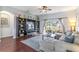 Inviting living room with large windows, a comfortable sectional sofa, and a view of the outdoors at 2132 Darlin Cir, Orlando, FL 32820