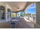 Covered outdoor patio with tables and chairs, ceiling fans, and views of the pool and water slide at 2132 Darlin Cir, Orlando, FL 32820