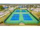 Four well-maintained tennis courts in a community setting at 2132 Darlin Cir, Orlando, FL 32820