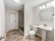 Clean bathroom with pedestal sink, toilet, and walk-in shower at 224 Alpine St, Altamonte Springs, FL 32701