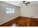 Well lit bedroom featuring hardwood floors and window at 224 Alpine St, Altamonte Springs, FL 32701