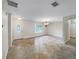 Spacious dining area with tiled floors and a chandelier at 224 Alpine St, Altamonte Springs, FL 32701