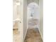 Clean hallway with tile floors and archway at 224 Alpine St, Altamonte Springs, FL 32701