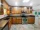 Modern kitchen with stainless steel appliances and granite countertops at 224 Alpine St, Altamonte Springs, FL 32701