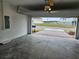 Attached garage with an automatic door opener at 224 Links Terrace Blvd, Daytona Beach, FL 32124