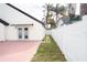 Private backyard with a patio and tall privacy fence at 2319 Island Club Way, Orlando, FL 32822
