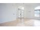Bright and spacious entrance hall with tile flooring and double doors at 2319 Island Club Way, Orlando, FL 32822
