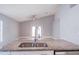 Granite kitchen island with stainless steel sink and faucet at 2319 Island Club Way, Orlando, FL 32822