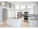 Modern kitchen with stainless steel appliances and granite countertops at 2319 Island Club Way, Orlando, FL 32822