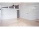 Open living room with tile flooring and high ceilings at 2319 Island Club Way, Orlando, FL 32822