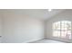 Simple bedroom with large window and carpet flooring at 2524 Parsons Pond Cir, Kissimmee, FL 34743