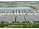 Aerial view of community with lake at 3013 Cherry Blossom Loop, St Cloud, FL 34771