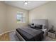 Guest bedroom with a queen-size bed and stylish decor at 3013 Cherry Blossom Loop, St Cloud, FL 34771