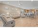 Bright and airy living room with neutral color palette and comfortable seating at 3013 Cherry Blossom Loop, St Cloud, FL 34771