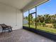 Relaxing screened patio overlooking the yard at 3013 Cherry Blossom Loop, St Cloud, FL 34771