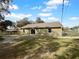 House exterior view with a large backyard at 3201 S Dorchester Dr, Deltona, FL 32738