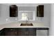 Kitchen features a pass-through window overlooking the living area at 3201 S Dorchester Dr, Deltona, FL 32738