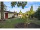 Spacious backyard with a patio and garden area at 3817 Bainbridge Ave, Orlando, FL 32839
