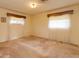 Spacious bedroom with neutral walls, carpeted floor, and ample natural light at 3817 Bainbridge Ave, Orlando, FL 32839