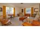 Mid-century living room with vintage furniture and carpeting at 3817 Bainbridge Ave, Orlando, FL 32839