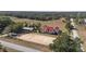 Aerial view of house, barn, and riding arena at 4230 Rex Dr, Winter Garden, FL 34787