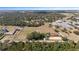Wide aerial view of expansive property with house and equestrian facilities at 4230 Rex Dr, Winter Garden, FL 34787