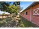 Red barn with horse in paddock at 4230 Rex Dr, Winter Garden, FL 34787