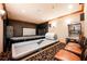 Fun game room featuring a trampoline, arcade game, and projector screen at 4230 Rex Dr, Winter Garden, FL 34787