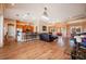 Open kitchen with island and hardwood floors at 4230 Rex Dr, Winter Garden, FL 34787