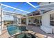 Relaxing pool and spa with covered patio at 4230 Rex Dr, Winter Garden, FL 34787