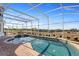 Relaxing screened-in pool with spa and open views at 4230 Rex Dr, Winter Garden, FL 34787