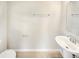 Simple bathroom with pedestal sink and a modern design at 4269 Desert Rose Ave, Kissimmee, FL 34746
