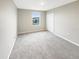 Spacious bedroom with a large closet and window at 4269 Desert Rose Ave, Kissimmee, FL 34746