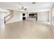 Open concept kitchen with island, stainless steel appliances, and granite countertops at 4269 Desert Rose Ave, Kissimmee, FL 34746