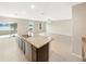 Open kitchen with views of the living room and backyard at 4269 Desert Rose Ave, Kissimmee, FL 34746