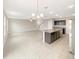 Spacious kitchen with an island and granite countertops at 4269 Desert Rose Ave, Kissimmee, FL 34746