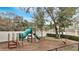 playground with slide, climbing structures, and wood chips at 4613 Eureka Ln, Sanford, FL 32773