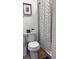Simple bathroom with shower and toilet, updated with modern fixtures at 4726 Combahee Ln, Orlando, FL 32837