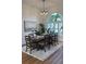 Formal dining room with large table and chandelier at 4726 Combahee Ln, Orlando, FL 32837