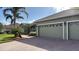 House exterior with double garage and walkway at 4726 Combahee Ln, Orlando, FL 32837