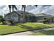 House exterior showcasing landscaping and driveway at 4726 Combahee Ln, Orlando, FL 32837