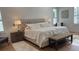 Spacious main bedroom with plush bed and wood floors at 4726 Combahee Ln, Orlando, FL 32837