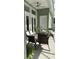 Relaxing patio with fire pit table and wicker furniture at 4726 Combahee Ln, Orlando, FL 32837