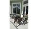 Relaxing patio with fire pit and wicker furniture at 4726 Combahee Ln, Orlando, FL 32837