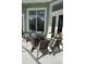 Relaxing patio with fire pit and wicker furniture at 4726 Combahee Ln, Orlando, FL 32837