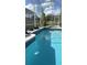 Inviting screened pool with tiled coping at 4726 Combahee Ln, Orlando, FL 32837